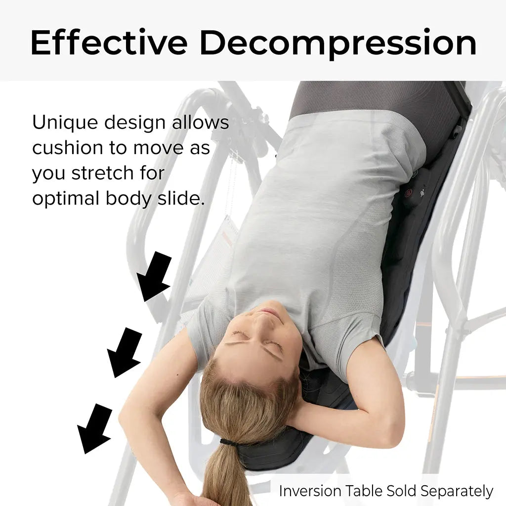 The FitSpine Heat and Vibration Comfort Cushion by Teeter is being used by a woman in a grey shirt. Its unique design enables the cushion to move with you as you stretch, providing effective decompression for optimal body alignment