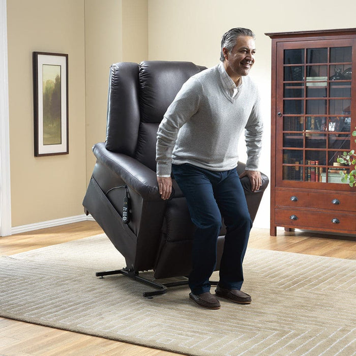 Man being assisted to stand up using the DreamMaker Lift Chair | Relax The Back | Zero Gravity Chairs | Reclinable Chair | Zero Gravity Recliner