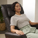 A woman using the Circa Zero Gravity Swivel Chair by Human Touch in espresso | Relax The Back