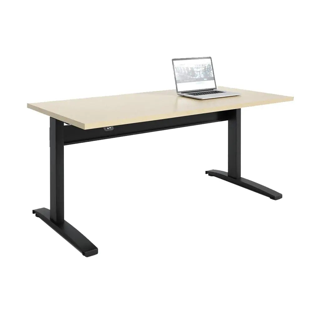 Display the Transcend Desk featuring a laptop placed on its surface, set against a white backdrop, showcasing a wooden top and a black base.