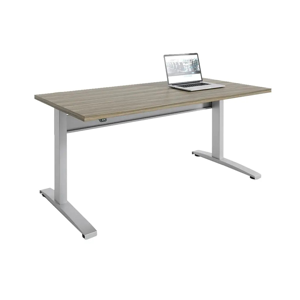Showcase the Transcend Desk with a laptop positioned on its surface. Set against a white background, the laptop highlights the desk's stomboli wooden top and grey base.
