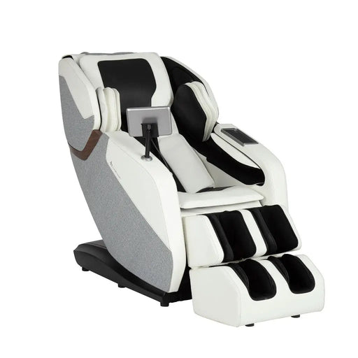 Massage chair with white and gray upholstery, leg and foot massagers, control tablet mounted on a stand, and reclining design.