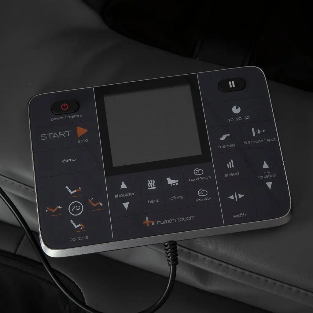 A view of the remote sitting on the arm of the  WholeBody® ROVE Massage Chair by Human Touch®