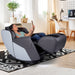 Side view of a woman in the Quies Full Body Massage Chair by Human Touch® in gray